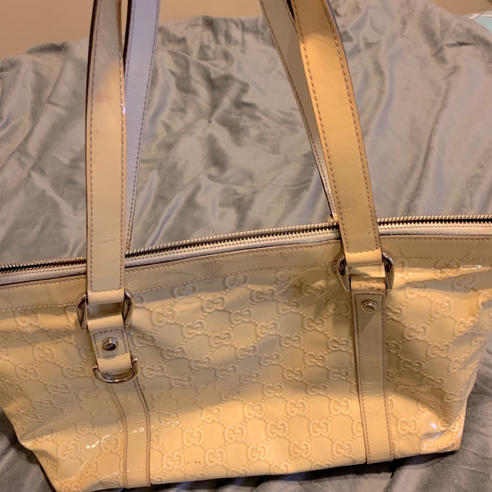 Gucci Purse Need to be cleaned